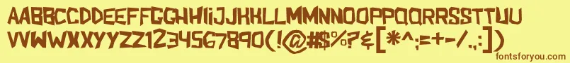 Shakeandbake-Schriftart – Braune Schriften auf gelbem Hintergrund