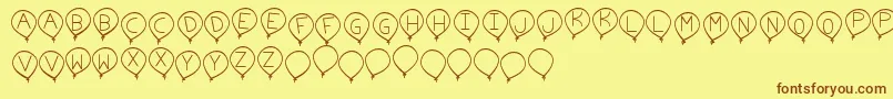 BirthdayBalonTfb Font – Brown Fonts on Yellow Background