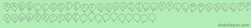 BirthdayBalonTfb-Schriftart – Graue Schriften auf grünem Hintergrund