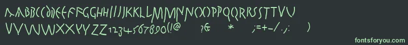 フォントQuickjuliusc – 黒い背景に緑の文字