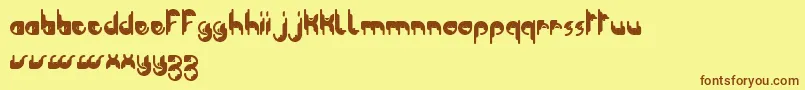 ModularTknoDkerBc Font – Brown Fonts on Yellow Background