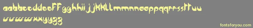 ModularTknoDkerBc Font – Yellow Fonts on Gray Background