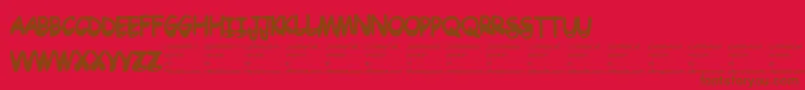 Drtoboggan Font – Brown Fonts on Red Background