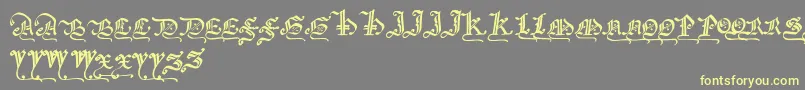 Gothicmajuscles Font – Yellow Fonts on Gray Background