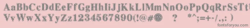 PuchakhonMagnifier3-fontti – harmaat kirjasimet vaaleanpunaisella taustalla