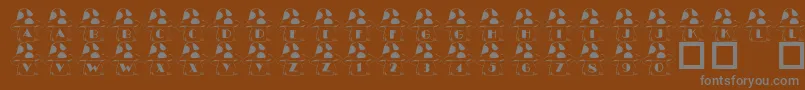 Saiba mais sobre a fonte 101InTheShroomz Fonte 101InTheShroomz – fontes cinzas em um fundo marrom