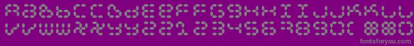 フォントDspl – 紫の背景に灰色の文字