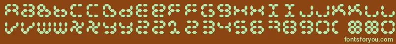 フォントDspl – 緑色の文字が茶色の背景にあります。