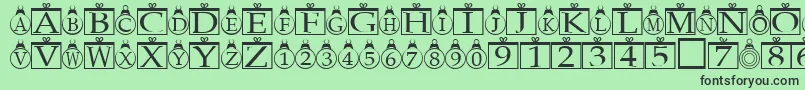 Xmasregular-fontti – mustat fontit vihreällä taustalla
