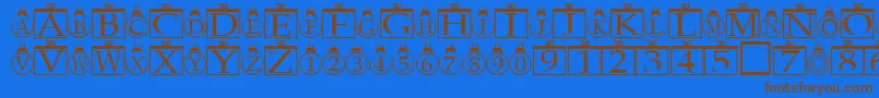 フォントXmasregular – 茶色の文字が青い背景にあります。