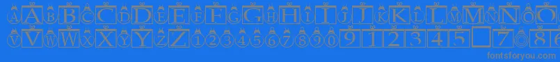 Xmasregular-fontti – harmaat kirjasimet sinisellä taustalla