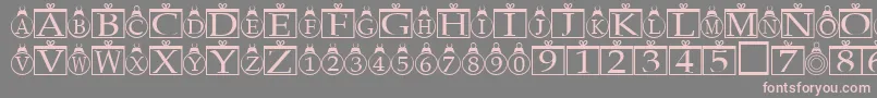 フォントXmasregular – 灰色の背景にピンクのフォント