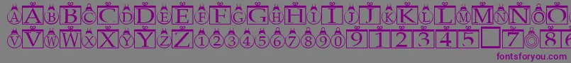 Шрифт Xmasregular – фиолетовые шрифты на сером фоне