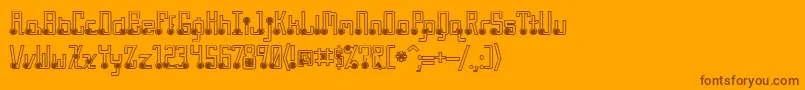 QuasidipitousBlackSpot-Schriftart – Braune Schriften auf orangefarbenem Hintergrund