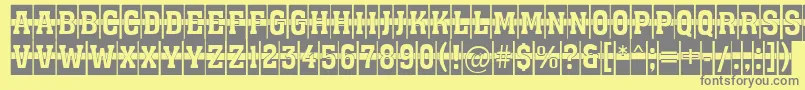 AAssuantitulcm1st Font – Gray Fonts on Yellow Background