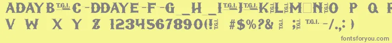 フォントTgifriday – 黄色の背景に灰色の文字