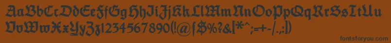 Dsfettethannhaeuser-Schriftart – Schwarze Schriften auf braunem Hintergrund