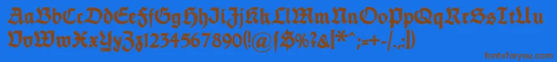 Dsfettethannhaeuser-Schriftart – Braune Schriften auf blauem Hintergrund