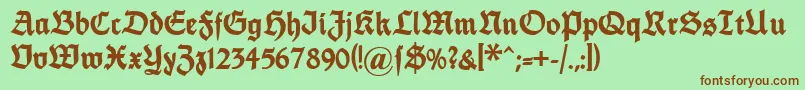 Dsfettethannhaeuser-Schriftart – Braune Schriften auf grünem Hintergrund