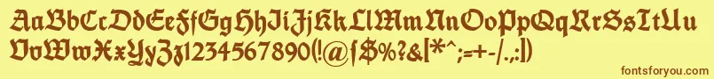 Dsfettethannhaeuser-Schriftart – Braune Schriften auf gelbem Hintergrund