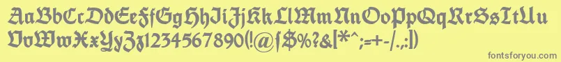 Dsfettethannhaeuser-fontti – harmaat kirjasimet keltaisella taustalla