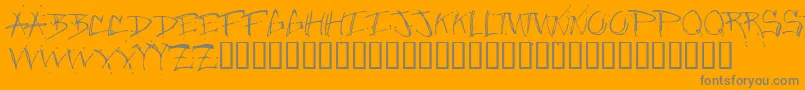 Jungleruff-Schriftart – Graue Schriften auf orangefarbenem Hintergrund