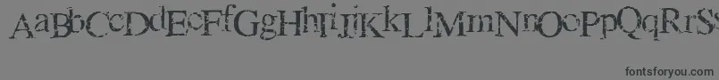 GeniusOfCrack-Schriftart – Schwarze Schriften auf grauem Hintergrund