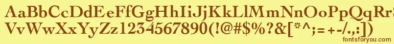 フォントCockneyBold – 茶色の文字が黄色の背景にあります。