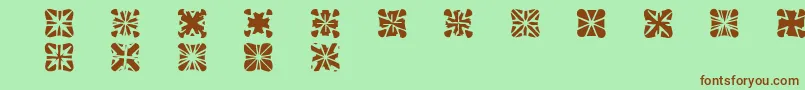 Zone23Crosses-Schriftart – Braune Schriften auf grünem Hintergrund