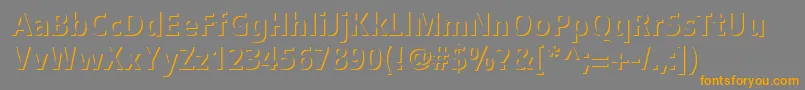 フォントStEmbie – オレンジの文字は灰色の背景にあります。