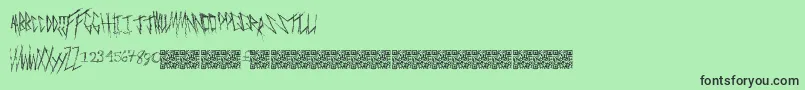 Freakymanor-fontti – mustat fontit vihreällä taustalla