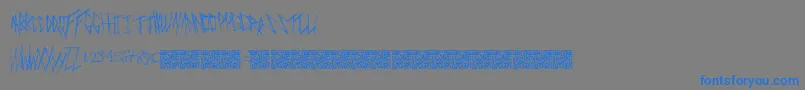 Czcionka Freakymanor – niebieskie czcionki na szarym tle