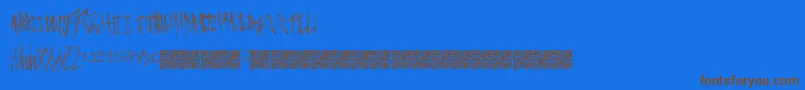 Czcionka Freakymanor – brązowe czcionki na niebieskim tle