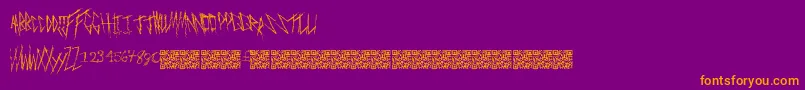 Czcionka Freakymanor – pomarańczowe czcionki na fioletowym tle