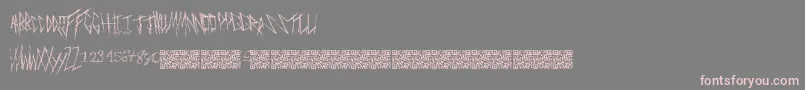 Czcionka Freakymanor – różowe czcionki na szarym tle
