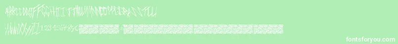 Czcionka Freakymanor – białe czcionki na zielonym tle
