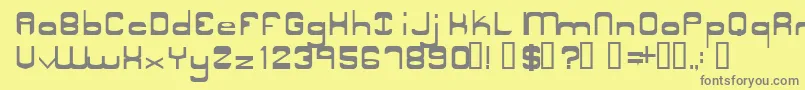 フォントNyakSquared1 – 黄色の背景に灰色の文字