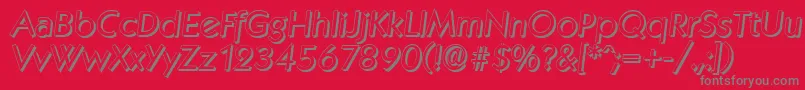 KoblenzshadowItalic-fontti – harmaat kirjasimet punaisella taustalla