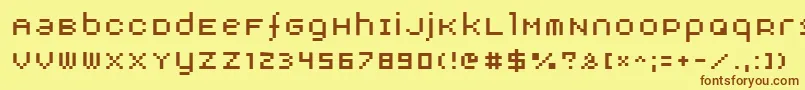 フォントAdbnorm – 茶色の文字が黄色の背景にあります。