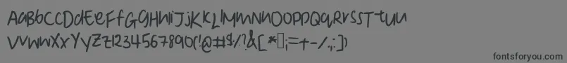 DeniseSManuscript Font – Black Fonts on Gray Background