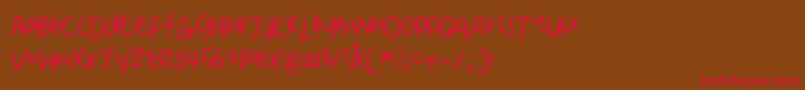 DeniseSManuscript Font – Red Fonts on Brown Background