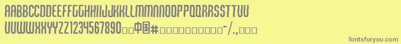 フォントQirof – 黄色の背景に灰色の文字
