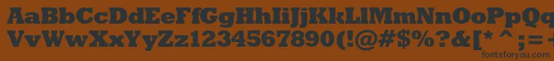 Rodeoxbc Font – Black Fonts on Brown Background