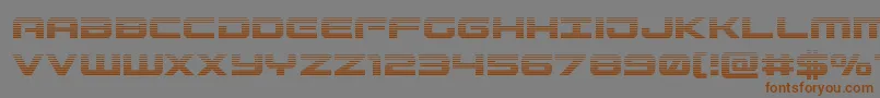 フォントGunshipgrad – 茶色の文字が灰色の背景にあります。
