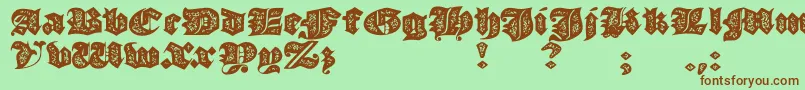 Fonte JmhMorenetaDivineOld – fontes marrons em um fundo verde