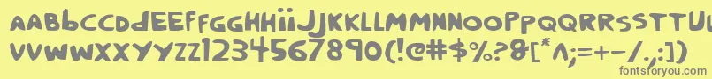 フォントCrappity – 黄色の背景に灰色の文字