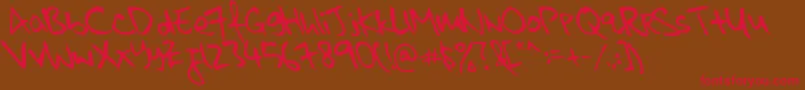 KkontagionPrintItalic Font – Red Fonts on Brown Background