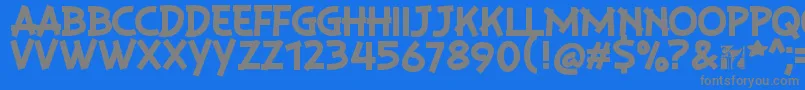 PlaysirRegular-fontti – harmaat kirjasimet sinisellä taustalla