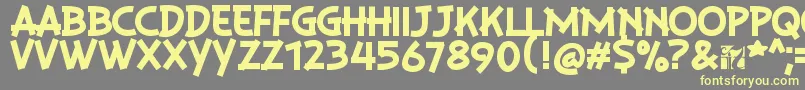 PlaysirRegular Font – Yellow Fonts on Gray Background