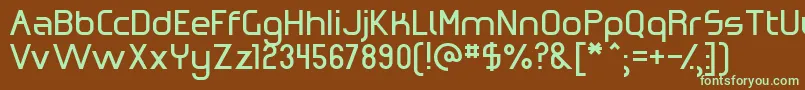 フォントOmicronZeta – 緑色の文字が茶色の背景にあります。